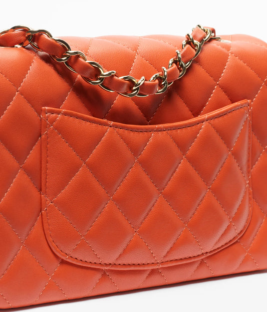 Bold & Beautiful — Chanel Lambskin & Gold-Tone Metal Bag in Dark Orange