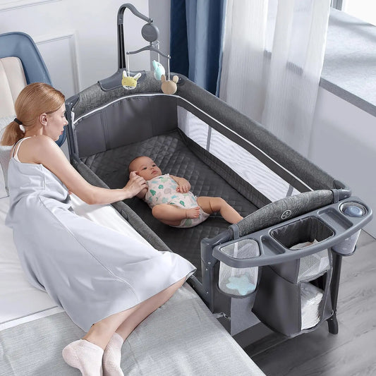 Baby Bassinet Bedside Crib, Pack and Play with Sheet, Diaper Changing Table and Music Mobile from Newborn to Toddles, Portable L